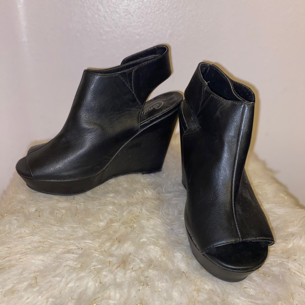 Black leather wedge booties